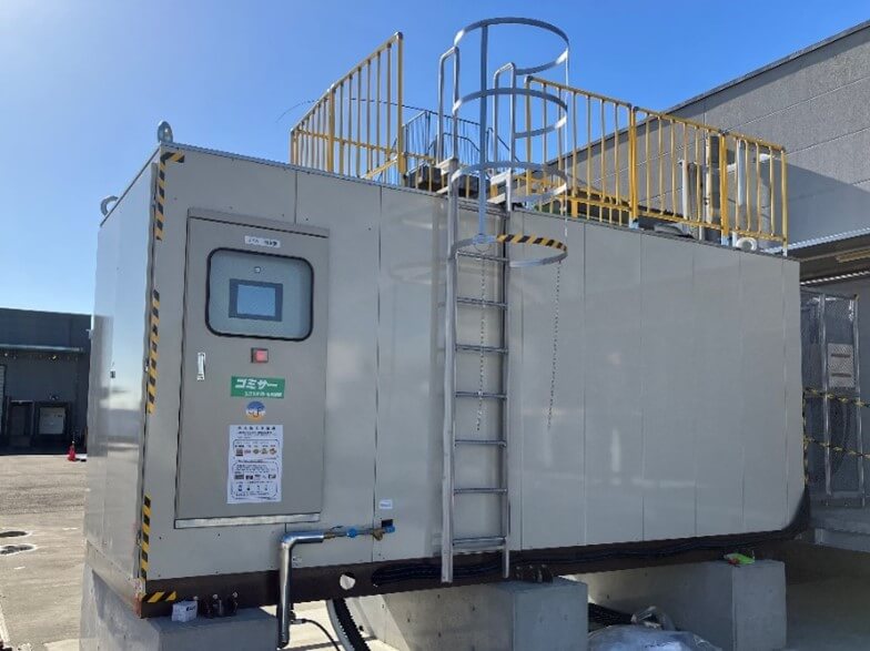 Organic waste decomposition system in operation at a plant