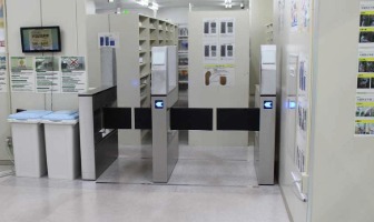 A security gate controlling access to the production area