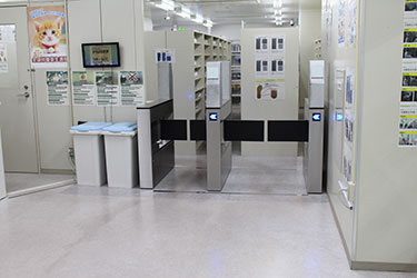 A security gate controlling access to the production area